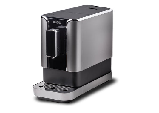 Der Unold Kaffeevollautomat LUCA ist ein moderner Kaffeevollautomat in Silber und Schwarz mit elegantem Design, einem Frontauslauf, einer Tropfschale und dem Unold-Branding auf der oberen Frontplatte vor weißem Hintergrund.