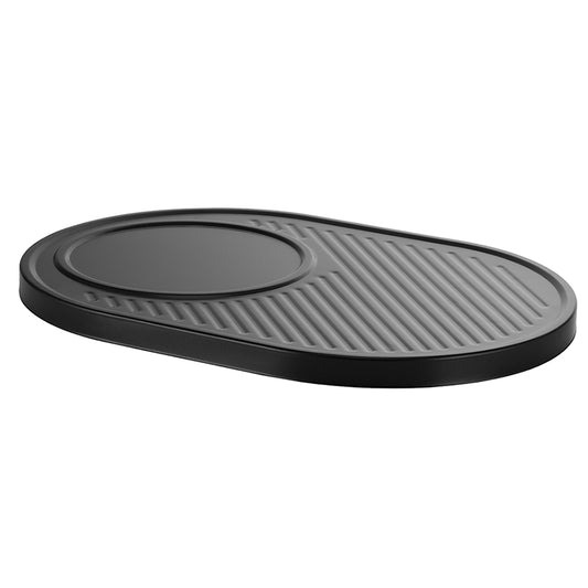 Die Unold Grillplatte Raclette Gourmet 4879501 ist eine schwarze, ovale Silikonplatte mit rundem Querschnitt und geriffelter Oberfläche, ideal zum Ordnen oder Trocknen von Speisen.