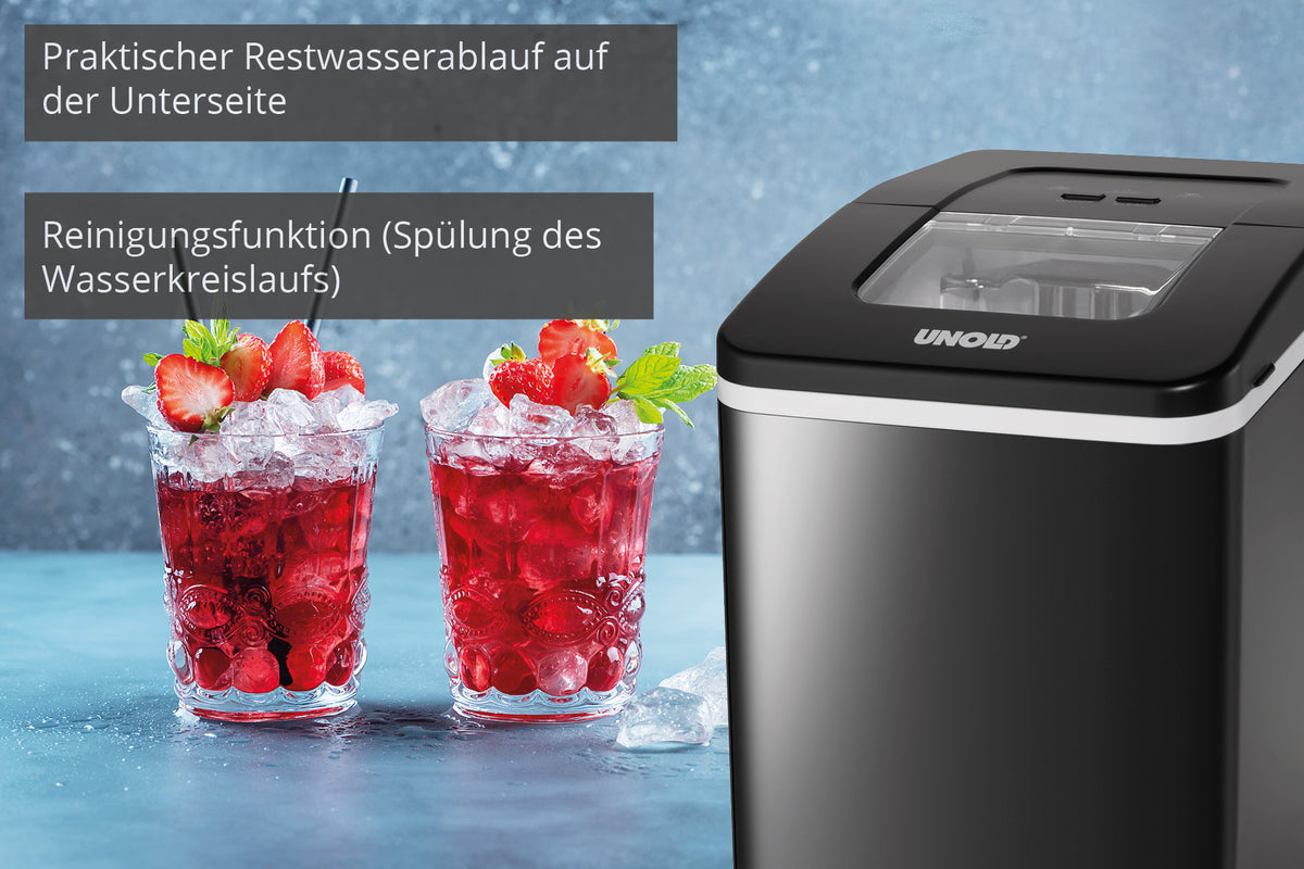 Ein schwarzer Unold Eiswürfelbereiter Freeze steht neben zwei Gläsern mit rotem Eisgetränk mit Erdbeeren und Minze. Deutscher Text hebt die praktische Wasserablauf- und Reinigungsfunktion hervor. Der Hintergrund ist hellblau.